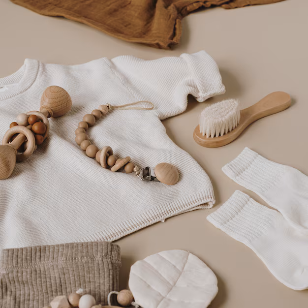 aesthetic-scandinavian-newborn-baby-clothes-care-accessories-toys-neutral-pastel-beige-colour-background-trendy-elegant-luxury-infant-set_408798-11333